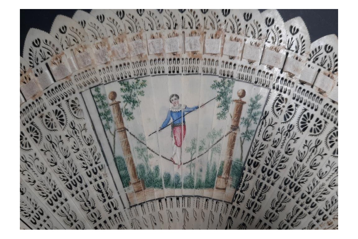 Three beautiful flowers and a tightrope walker. Four images fan circa 1820-30