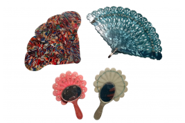 Fantastic plastic! Novelty fans, art deco period.